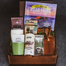 Camping gift set with camp mugs, snacks, and a travel book in a walnut wood gift box