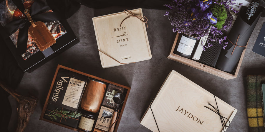 Collection of branded and custom engraved curated gift boxes by Dusky Lark