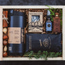 Gift set withBruTrek tumbler, Rock Creek Soaps product, and other items in a wooden box.